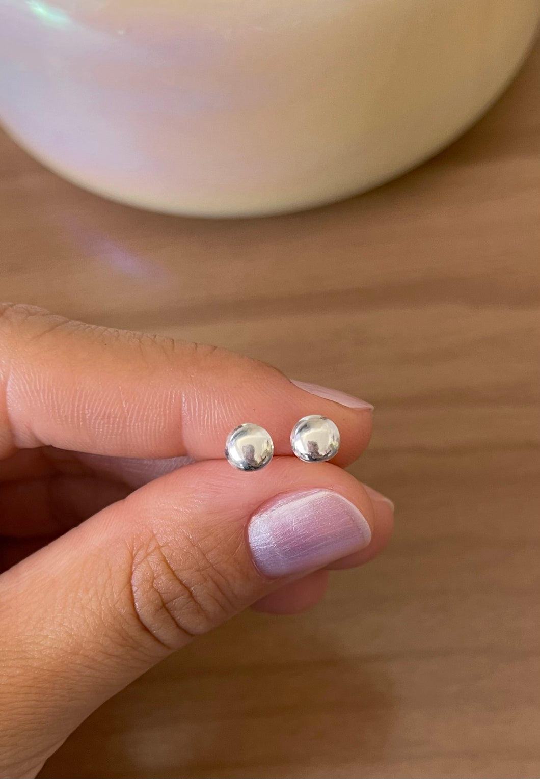 Brinco bola achatada