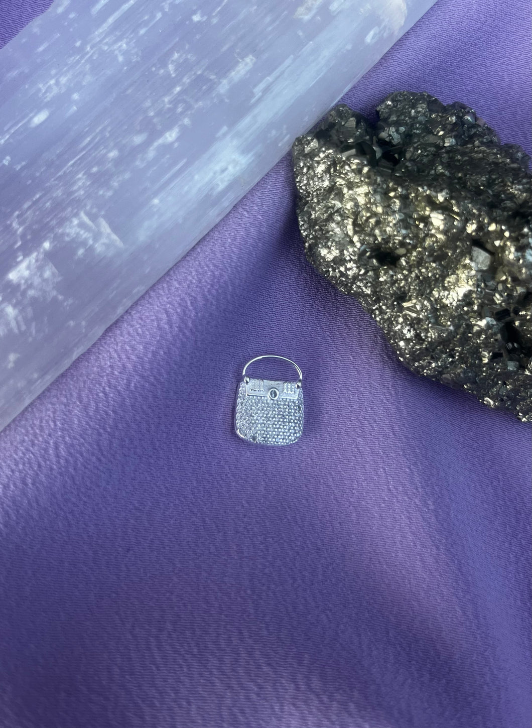 Pingente Bolsinha Crav.